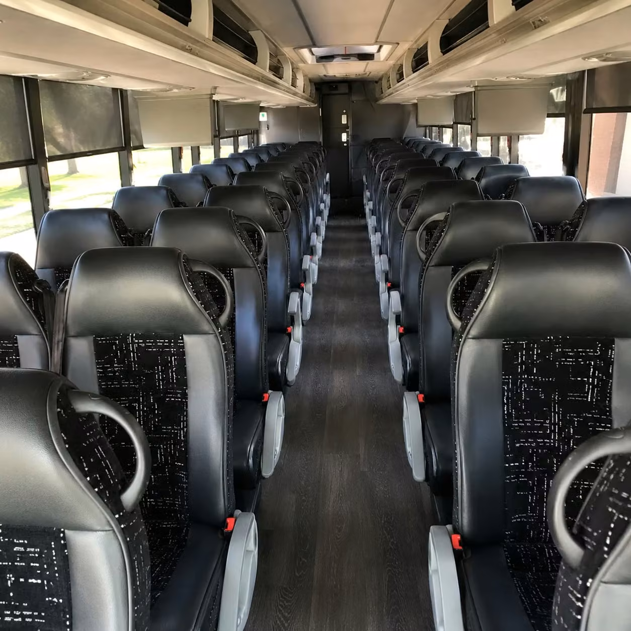 norman 56 passenger charter bus rental